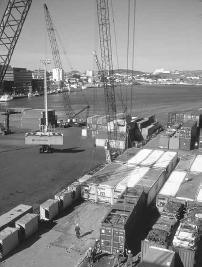 Containers being unloaded at St. John's Harbor. © Momatiuk/Eastcott/Woodfin Camp.