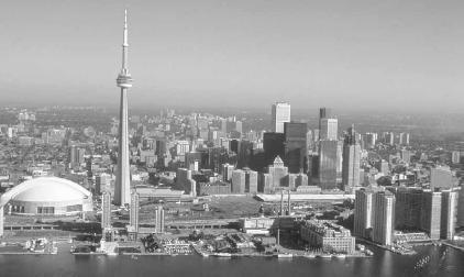 The CN Tower and Skydome in Toronto. With a population of about 4 million, Toronto is Canada's largest city and headquarters for many Canadian corporations. Canadian Tourism Commission photo.
